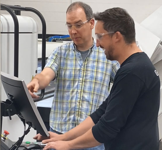 Great Northern Corporation workers in the testing lab