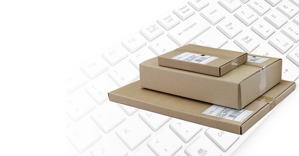 Stacked boxes and a keyboard